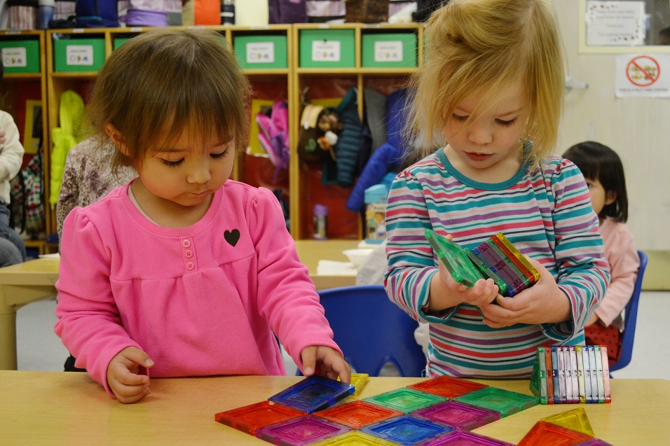 chidren playing with magnets